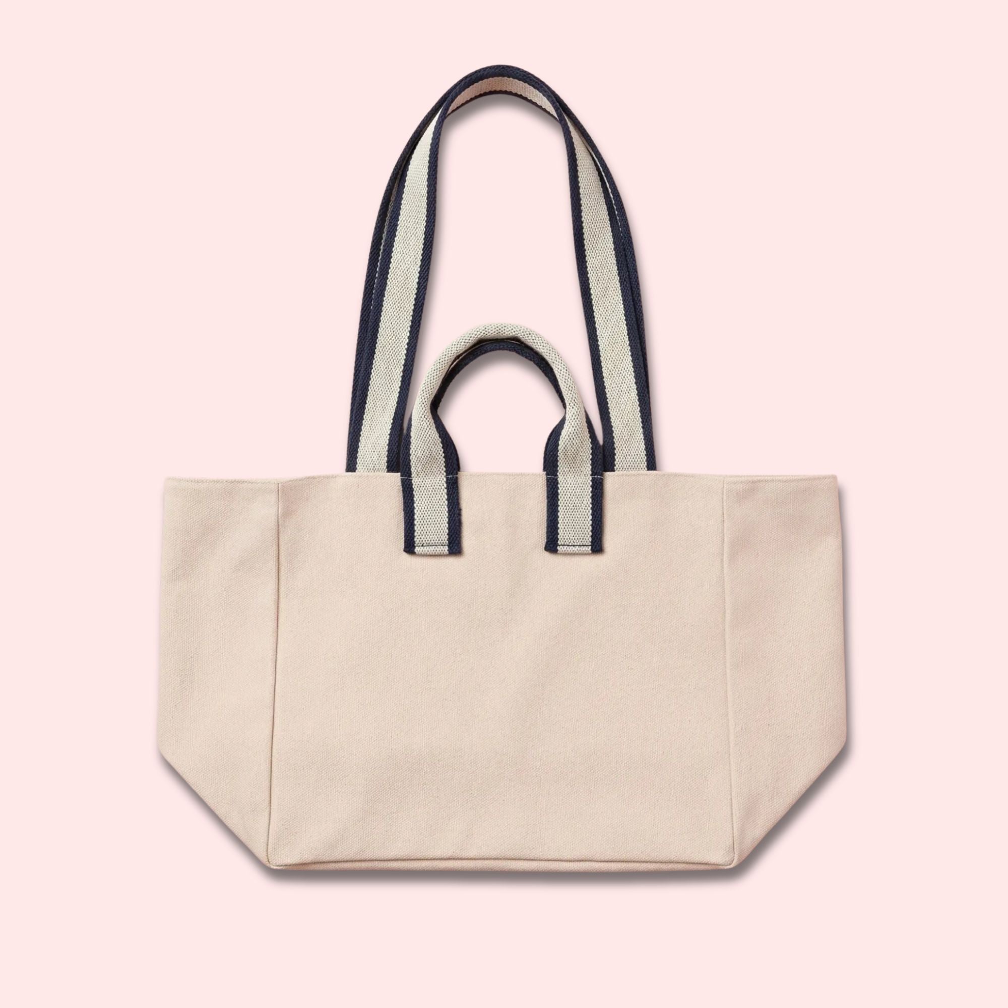 Custom canvas tote bag with name patch in off-white cotton and navy stripe handles