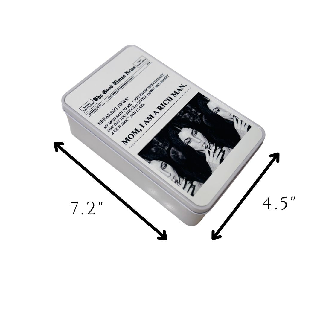 small tin box with newspaper design art